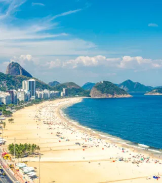 copacabana beach in South America - Cadillac Travel, Detroit, MI