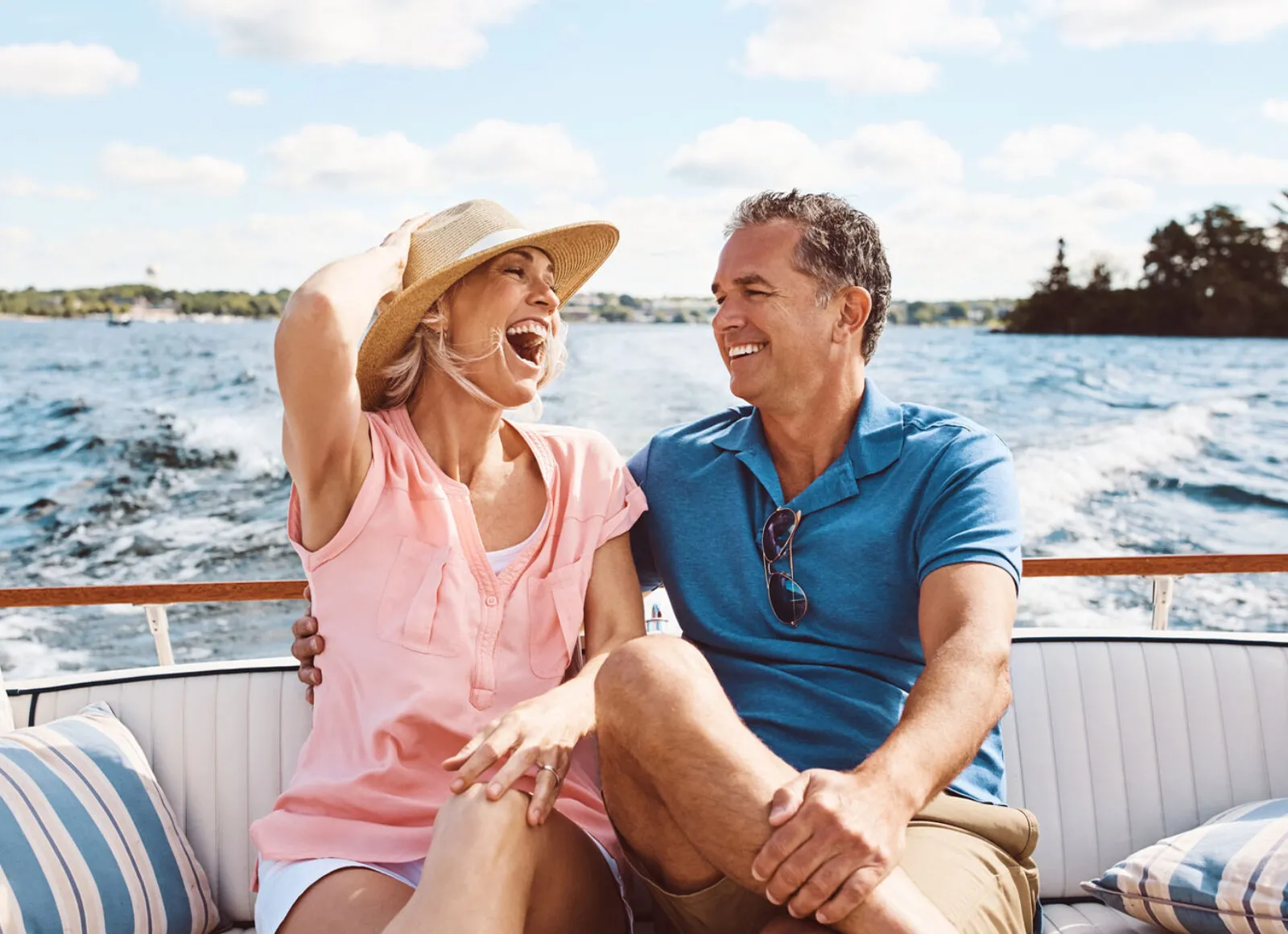 couple enjoying a river cruise - Cadillac Travel, Detroit, MI