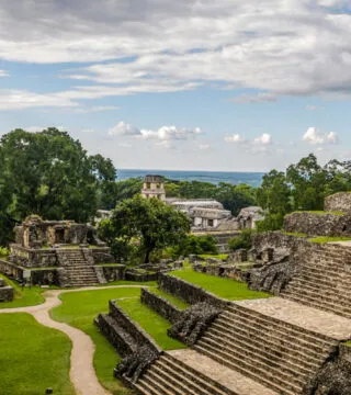 mayan temples with jungle in the background - Cadillac Travel, Detroit, MI