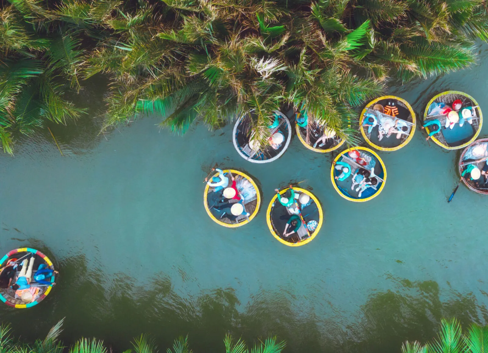 Small boat travel down a river - Cadillac Travel