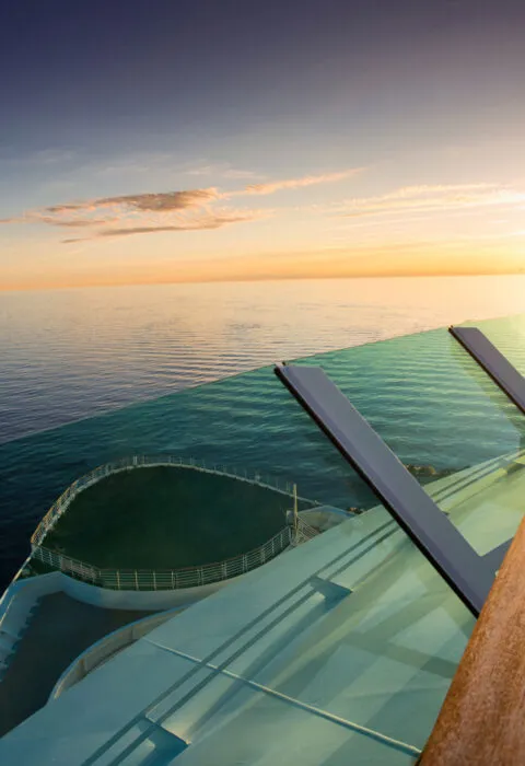 looking down at the ocean from the from of a small ship - Cadillac Travel, Detroit, MI