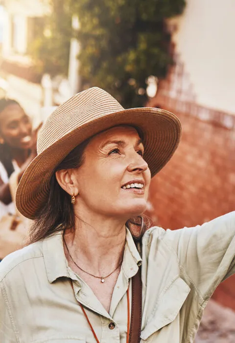 Tour guide showing tourist around - Cadillac Travel, Detroit, MI