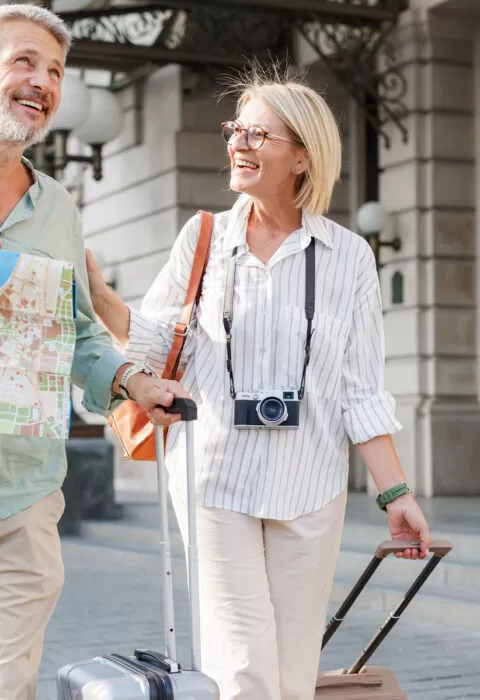 couple sightseeing in new city - Cadillac travel